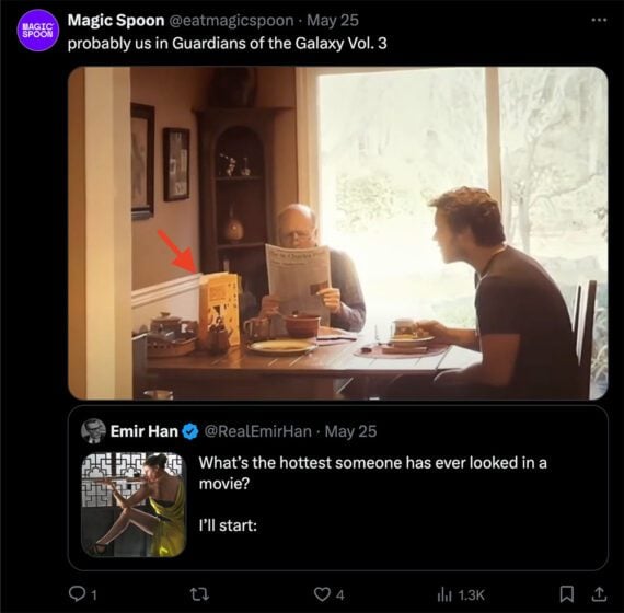 Photo and a younger man and older man eating breakfast